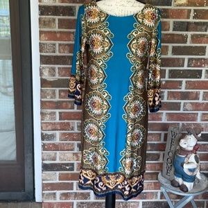 3/4” length sleeves.  Great dress for cool indoors and outdoors.